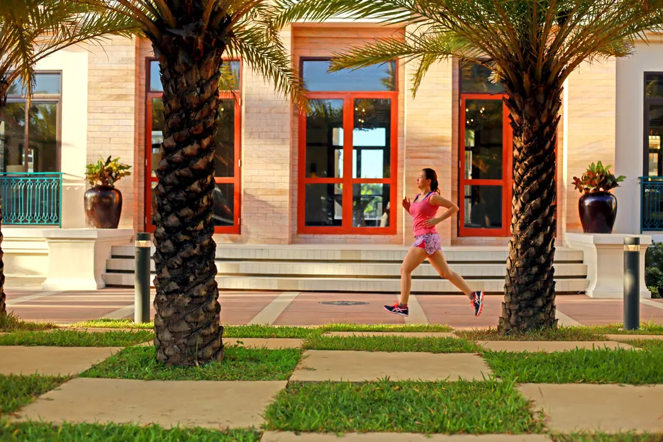 Landscaped pedestrian path beside Amalfi residential buildings