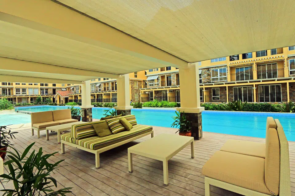 Covered poolside lounge overlooking the Amalfi resort pool