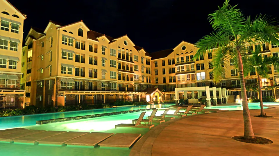 Amalfi sunken deck beside the resort pool at night