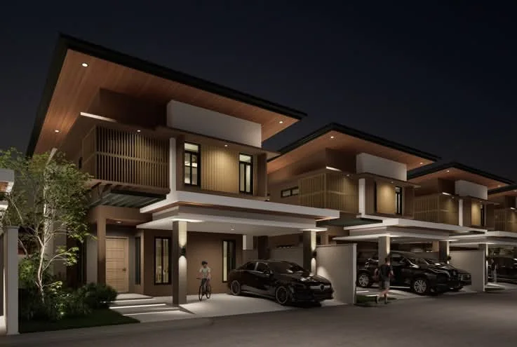 Arcenas Highland Residences exterior at night