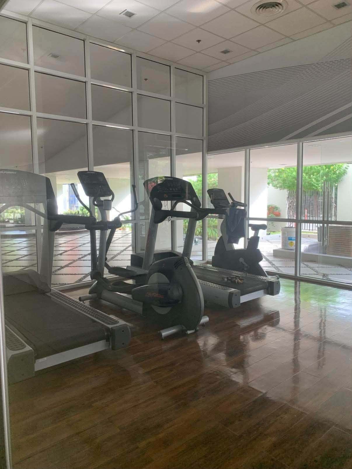 Shared fitness gym — cardio equipment