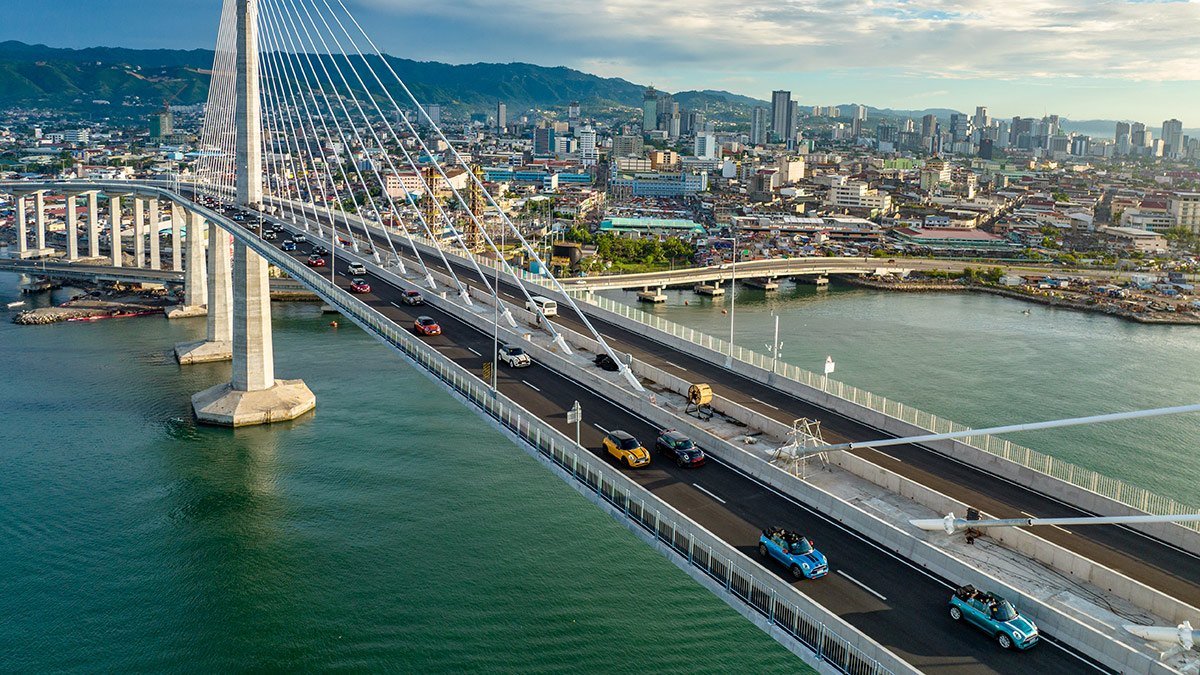 Cebu-Cordova Link Expressway with the Cebu skyline in the background